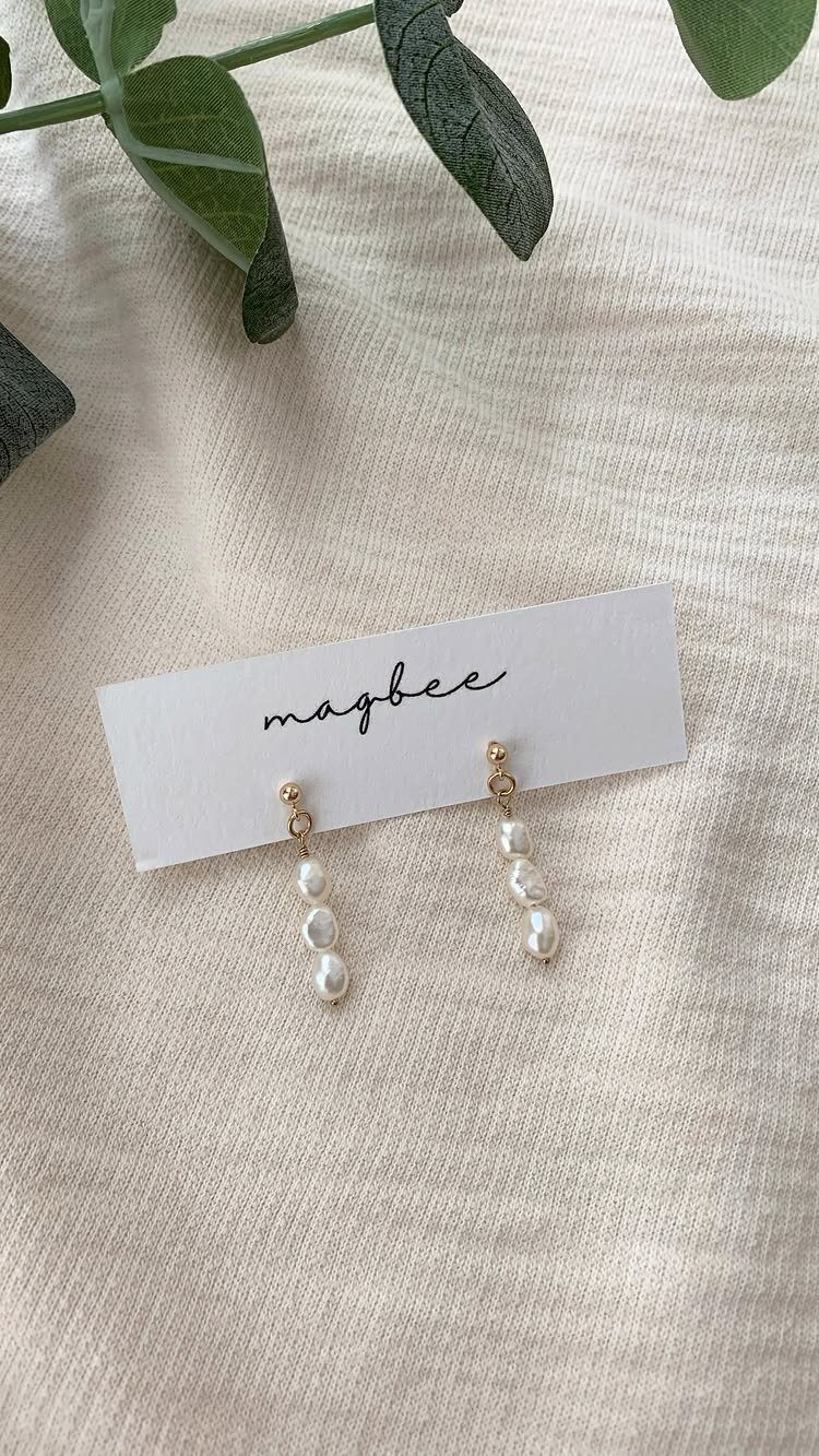 Bridesmaid Jewelry Gold: 10 Ideas for Every Wedding Style 1 Two gold drop earrings with three white pearls on a white brand card.