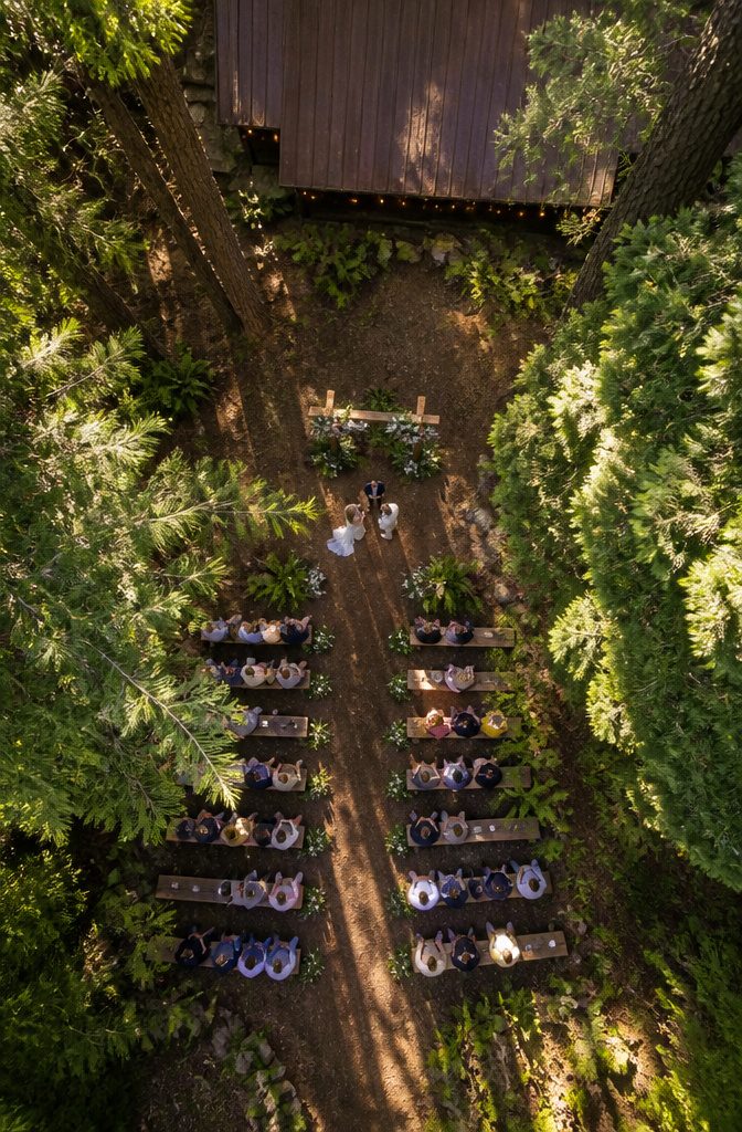 Forest Wedding Ceremony Venues and Sites in Minnesota 11 Forest wedding ceremony area at Pinewood with trees and seating.