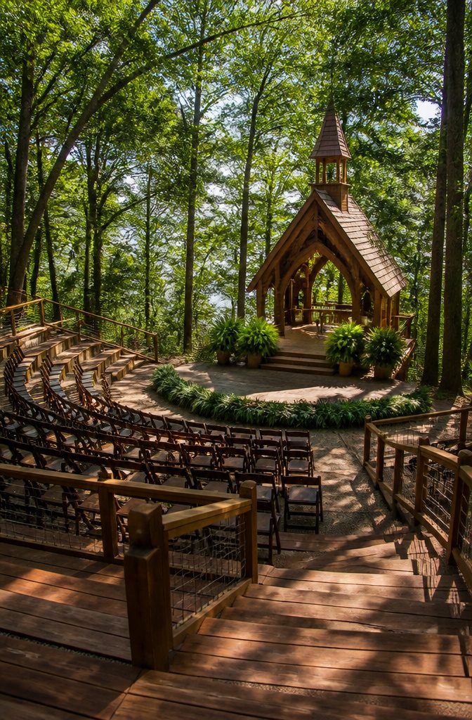 Forest Wedding Ceremony Venues and Sites in Minnesota 3 Amphitheater at Woods Retreat surrounded by trees.