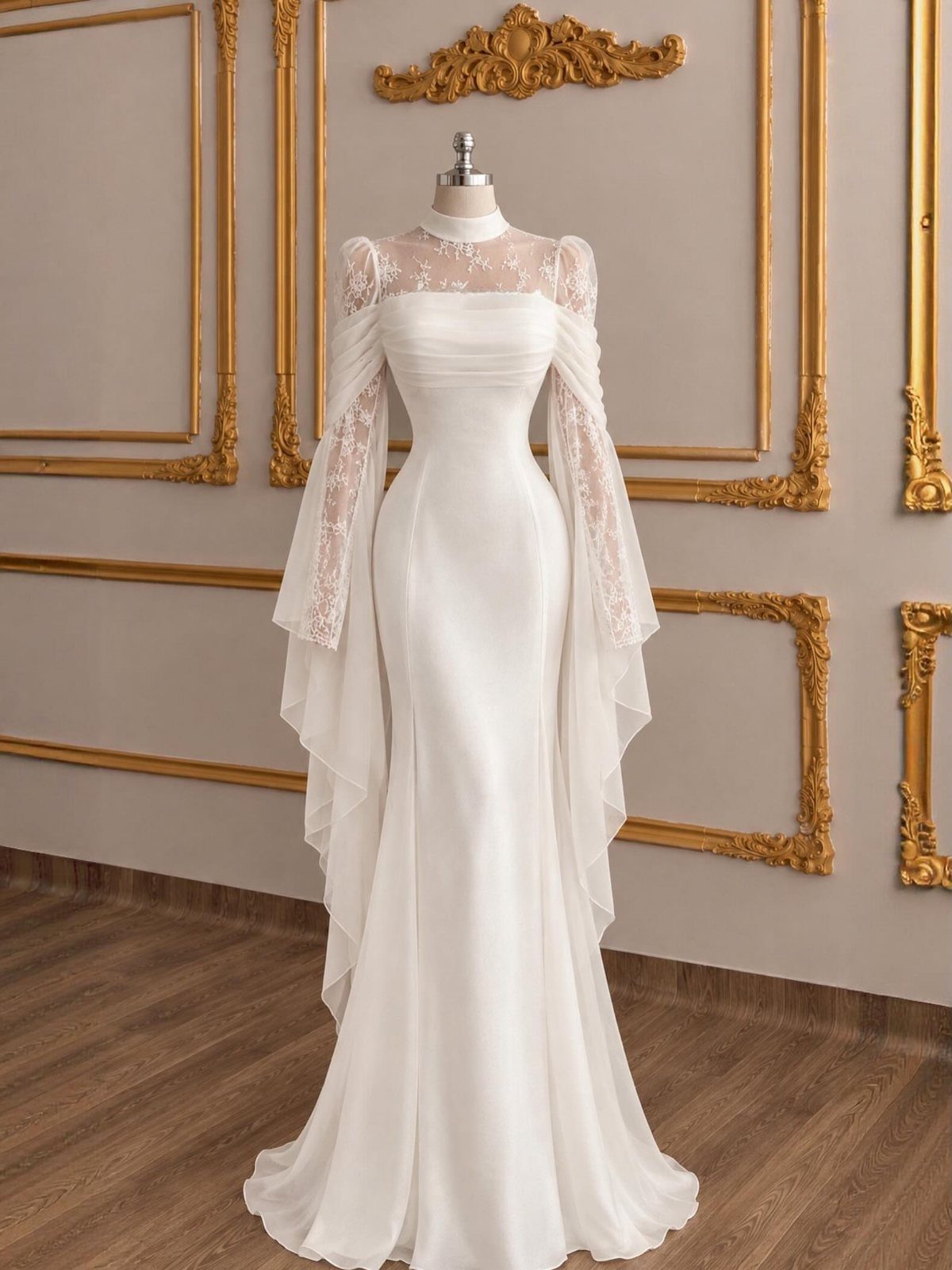 White wedding dress with lace illusion neckline and long flowing sleeves on a mannequin.